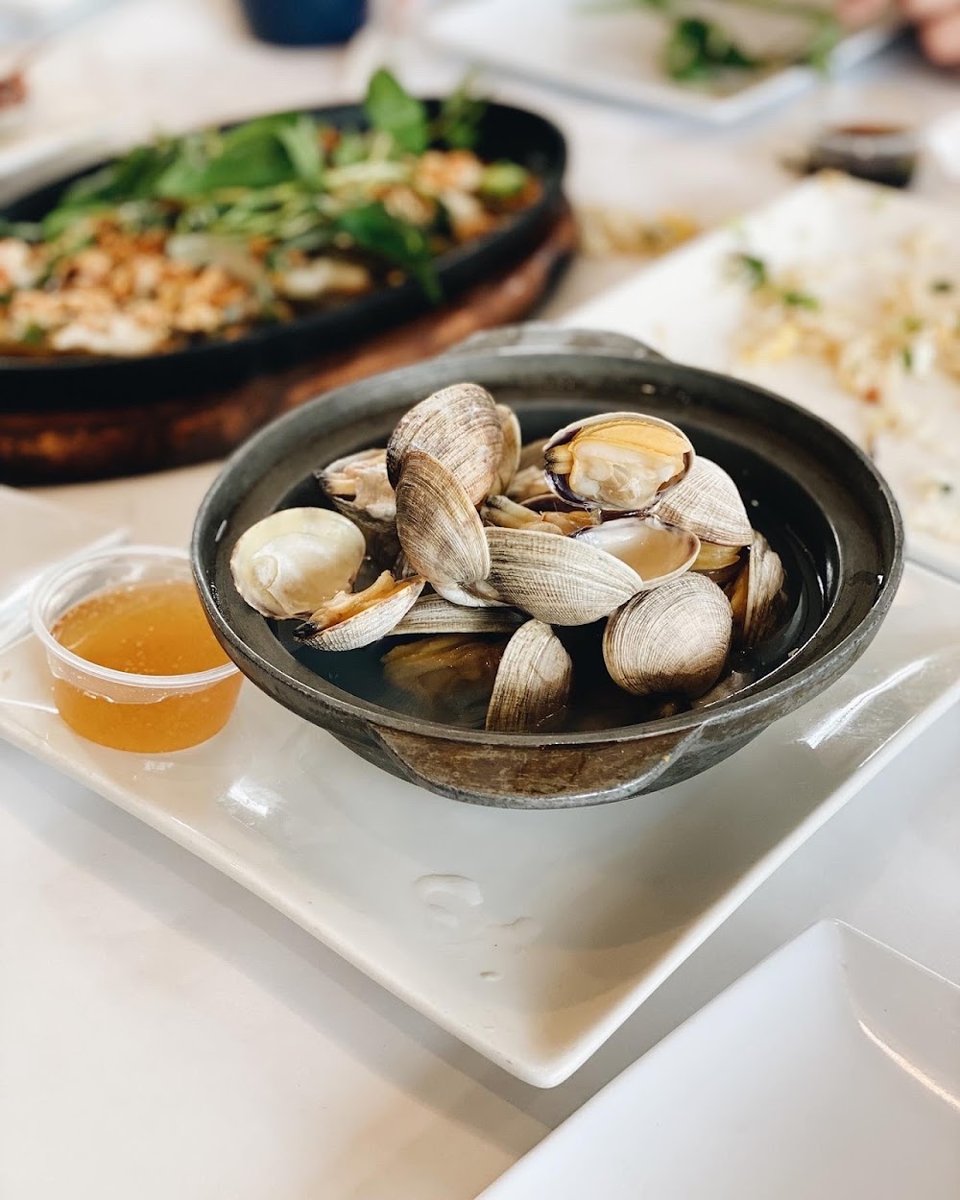 Printed menu with seafood and hot pot sections.