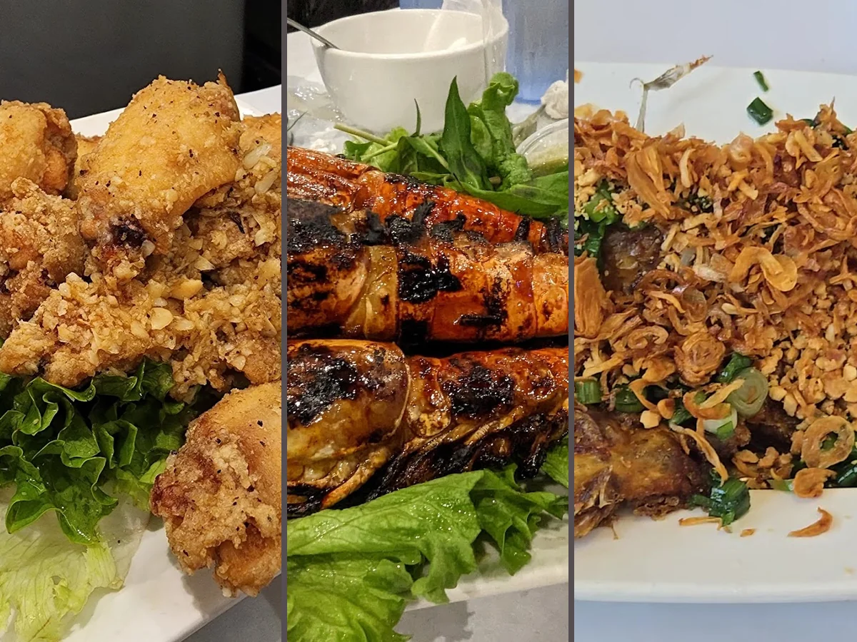 Seafood dishes on a casual restaurant table.